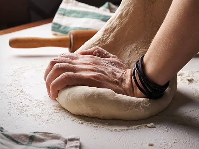 Hands Working With Dough